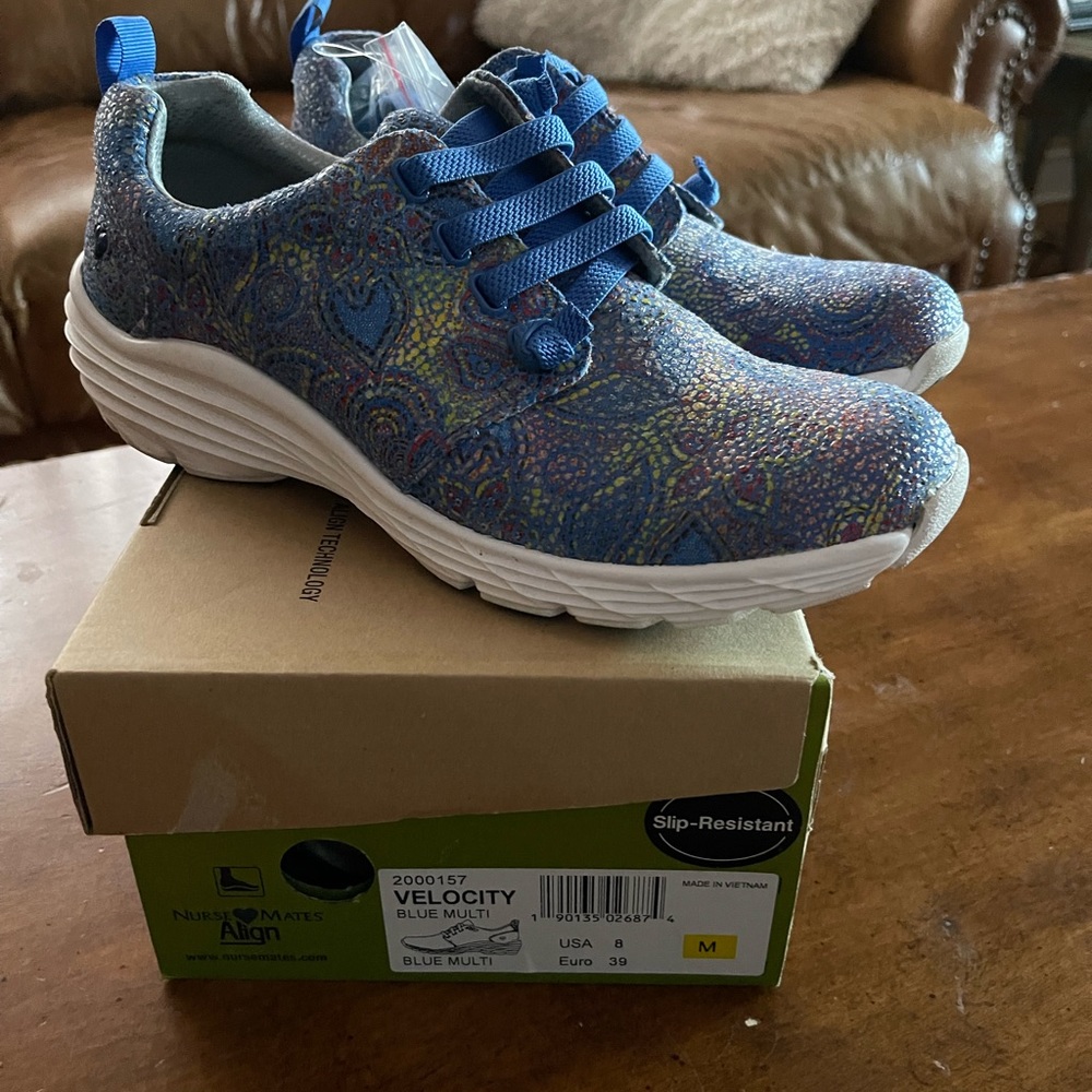 New in box. Nursing shoes size 8.